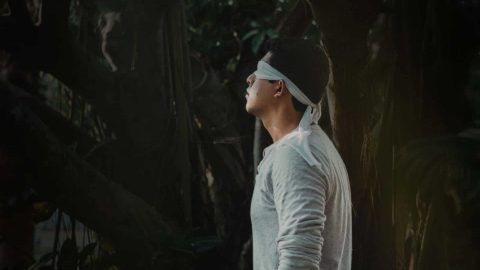 A man blindfolded representing secularism and the unbelief in the supernatural.